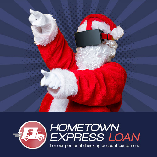 Hometown Express Loan. Santa pointing with a Virtual Reality headset on.